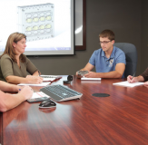 employee meeting at hti plastics